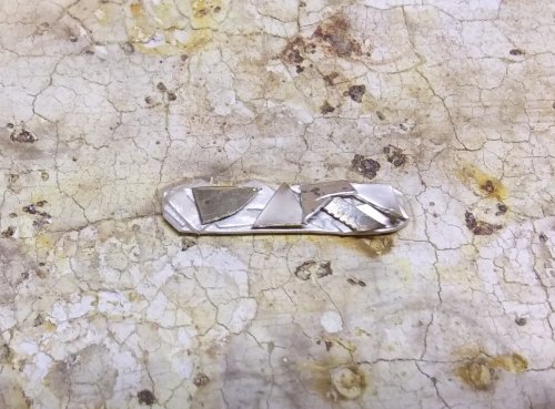 Judy Larson's Argentium Silver Scrap Chain - , Contemporary Wire Jewelry, Making Chain, Chain Making , Butane Torch, Soldering, Solder, Layer the T-bar metal strip with scrap and fuse